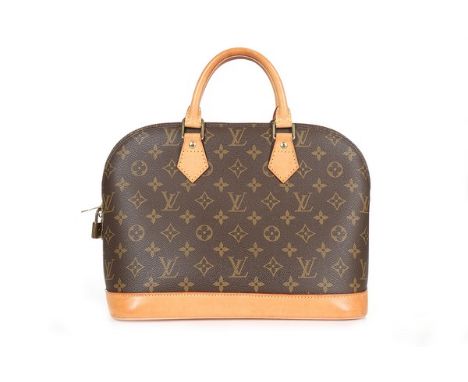A Louis Vuitton monogrammed leather 'Alma' handbag, 1990s, with padlock, keys, lined in brown canvas and with two interior po