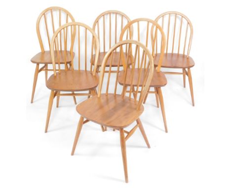Six Ercol beech and elm Model 370 Windsor dining chairs.