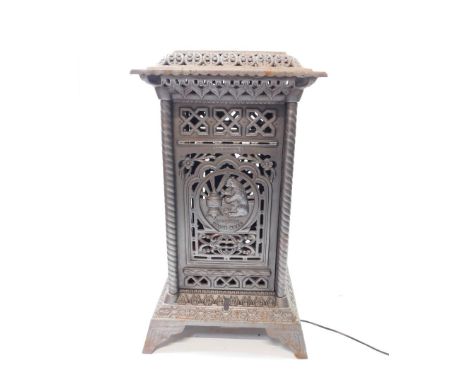 An Omega late 19thC cast  iron heater, patent no 22153., of square form, cast with a bear and burner motif, flowers and leave