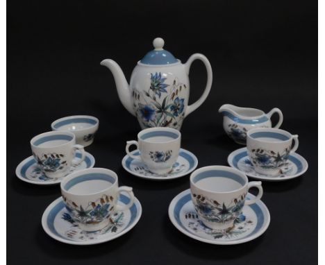 A Wood &amp; Sons pottery part coffee service decorated in the Blue Meadow pattern, comprising coffee pot, cream jug and suga