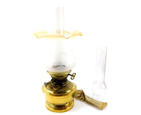 A Messenger Annular brass oil lamp, No 64C, with glass chimney and frosted and etched glass shade, 45cm high., together with 