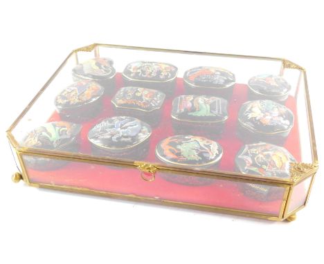 Twelve Malaysian porcelain musical boxes, for Franklin Mint, variously shaped, printed marks, playing Cinderella., The Nutcra