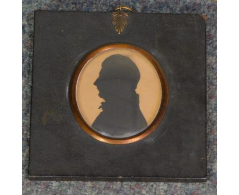 19thC English School. A miniature silhouette portrait of a gentleman, facing left, 71mm high, 63mm wide.