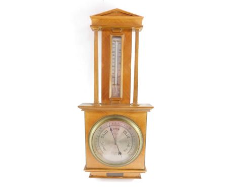 A mid 20thC walnut cased barometer by Negretti &amp; Zambra, London, R/3313, with thermometer, the case of architectural temp