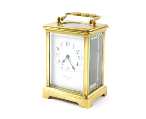 A French late 19thC brass cased carriage clock, by Drayton &amp; Son, Paris, rectangular enamel dial bearing Arabic numerals,