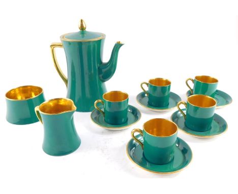 A Carlton ware early 20thC green and gilt coffee service, comprising coffee pot, cream jug and sugar bowl, five demi tasse ca