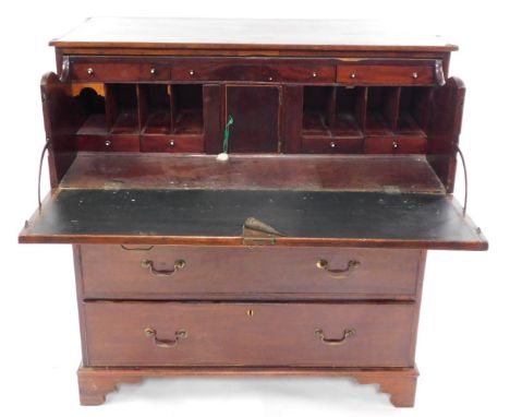 A George III mahogany and satin wood cross banded secretaire chest, the secretaire drawer opening to reveal seven drawers, ei