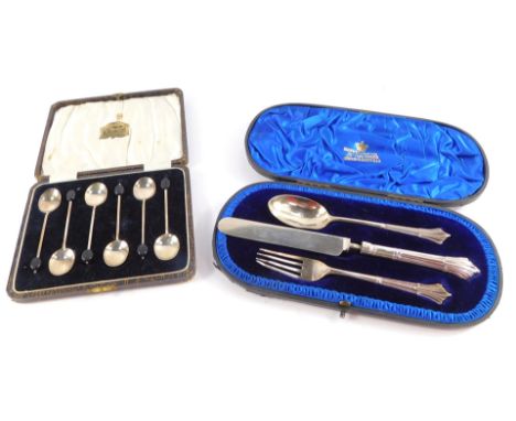 A Victorian three piece cutlery set, decorated in the Albany pattern, comprising knife, fork and spoon, cased, Mappin &amp; W