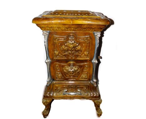 A French late 19thC Goudin cast iron polished metal and enamel stove, Model No 287., of serpentine form with a hinged cover a