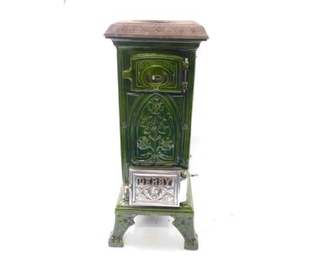 A Nestor-Martin Derby late 19thC cast iron and enamel stove, of rectangular column form, moulded with flowers, with a polishe