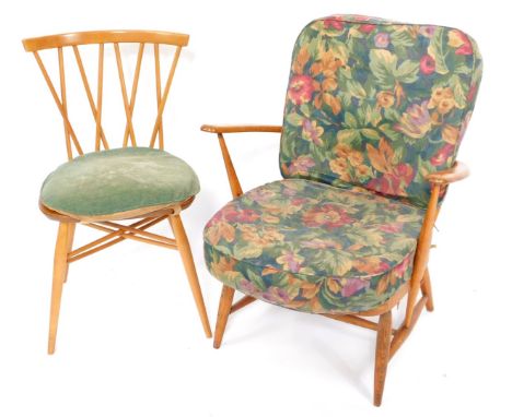 An Ercol beech and elm low Windsor armchair, with loose floral cushion seats, together with an Ercol candlestick lattice beec