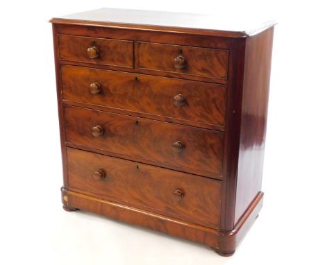 A Victorian mahogany chest, of two short over three long graduated drawers, raised on a bracket base, over bun feet, 114cm hi