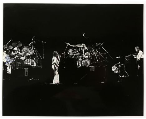 Genesis & related collection including an autographed b/w photo of the band playing live (signed by Hackett?, Rutherford, Col