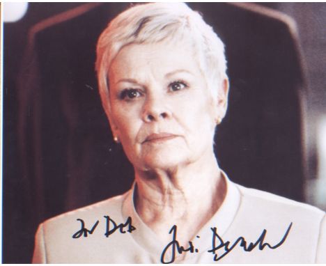 Dame Judi Dench signed 10x8 picture as M from the Bond franchise. Good condition. All autographs come with a Certificate of A