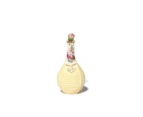 A Chelsea scent bottle, c.1755, modelled as a bottle contained in a yellow wicker basket, the neck painted with sprays of flo