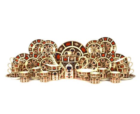 A Royal Crown Derby tea and coffee service, c.1979, richly decorated in pattern 1128 with an Imari design of stylised foliate