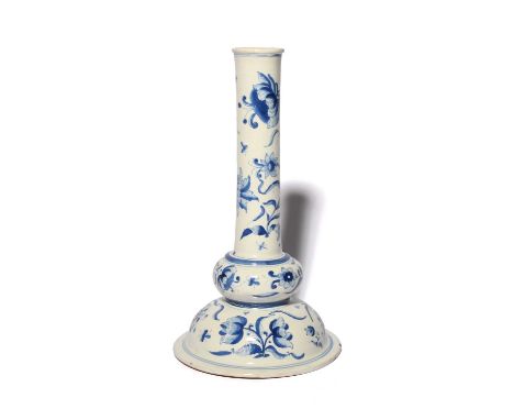 A rare and large Delft candlestick, c.1750, probably Harlingen region, decorated in the manner of Pals Karsten with tulips an