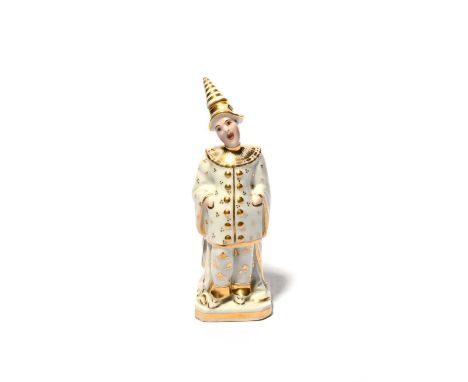 An unusual Paris porcelain scent bottle or flask, 19th century, modelled as a singing pierrot wearing an Eastern style costum
