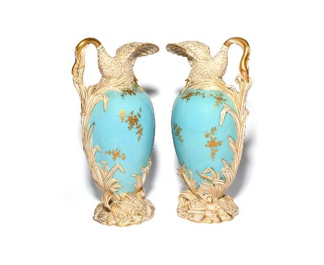 A large pair of English porcelain ewers, 19th century, probably Brown-Westhead Moore &amp; Co., the ovoid bodies with gilt fl