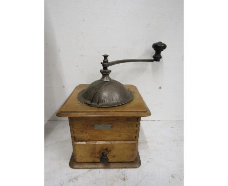 A vintage coffee grinder&nbsp;