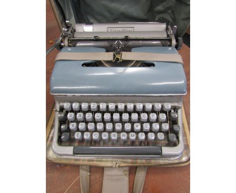Blue Bird typewriter in case 1960s