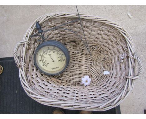 A garden clock and a laundry size basket&nbsp;