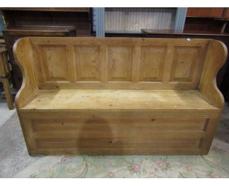 A pine pew/ Monks bench with lift up seat 150cmW 92cmH 34cmD