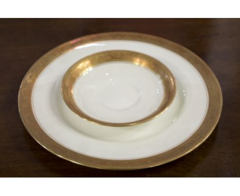 PART DINNER SERVICE, Royal Worcester gilt edged bone china, comprising twelve dinner and side plates, eleven soup bowls, four