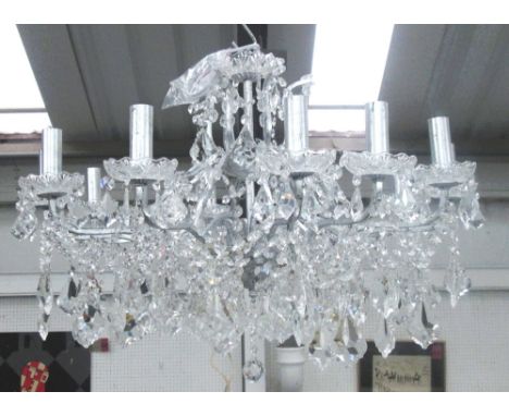 CHANDELIER, Louis XV style, twelve branch silver frame with crystal faceted drops, approx 82cm W x 70cm H (not including chai