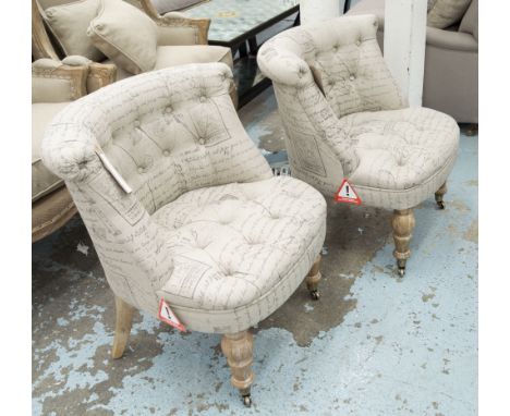 BEDROOM CHAIRS, a pair, button back, in printed fabric on front castors, 66cm W. (2)