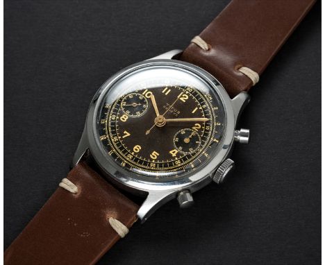 A VERY RARE GENTLEMAN'S LARGE SIZE STAINLESS STEEL TITUS "CLAMSHELL" CHRONOGRAPH WRIST WATCH  CIRCA 1940s, WITH GLOSS BLACK G