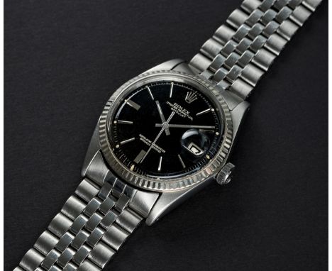 A RARE GENTLEMAN'S STEEL & WHITE GOLD ROLEX OYSTER PERPETUAL DATEJUST BRACELET WATCHCIRCA 1965, REF. 1601 WITH GLOSS BLACK DI