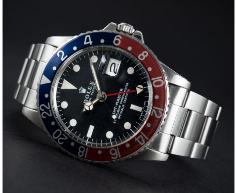 A RARE GENTLEMAN'S STAINLESS STEEL ROLEX OYSTER PERPETUAL GMT MASTER BRACELET WATCHCIRCA 1972, REF. 1675 WITH MK2 MATT DIALMo