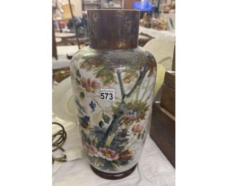A vintage hand painted vase