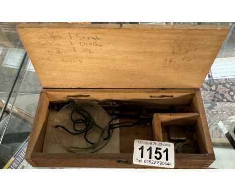 A boxed jeweller scales