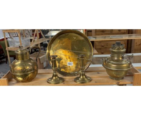 A brass Army &amp; Navy CSL makers London lidded pot, A pair of candlesticks, oil lamp &amp; tray