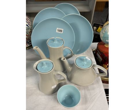 A quantity of Poole pottery tea pots, plates etc