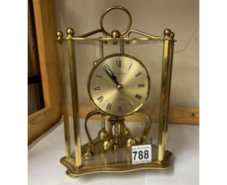 A Canterbury quartz brass mantle clock