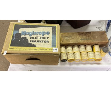A boxed Magiscope 35mm film strip projector &amp; A quantity of boxed cartoons