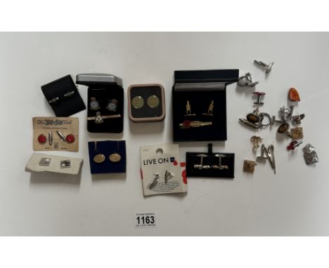 A boc of cufflinks including dad's army, Royal Air force etc
