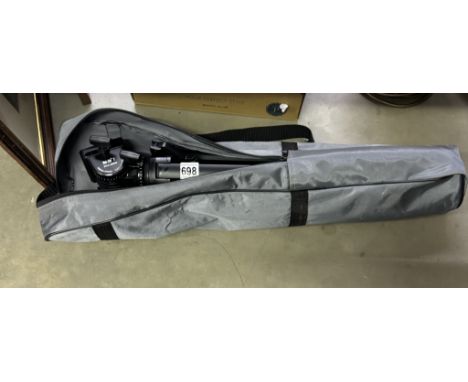 A Vel-flo 7 Ph-358 camera tripod