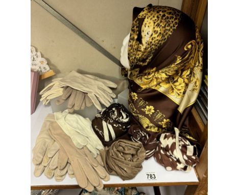 A quantity of vintage ladies gloves &amp; head scarves