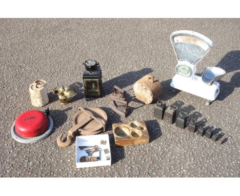 Pair of Avery weighing scales, 2 large iron weights, GPO and other weights, pulley, 2 irons, keys, wall mounted hand crank fi