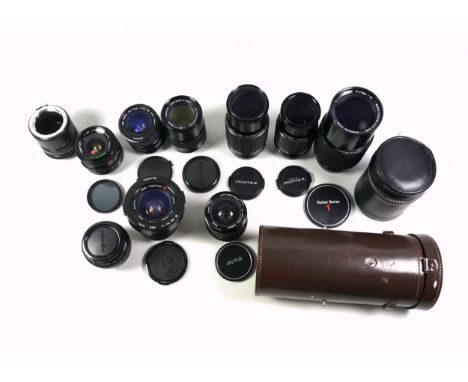 9 camera lenses including Minolta, Pentax, Vivtar, and Tokina. (9)