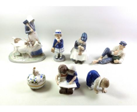 Royal Copenhagen porcelain group of a lady holding a mallet and pegs with 2 goats, 694, H.23cm; Amager girl knitting, 1314; y