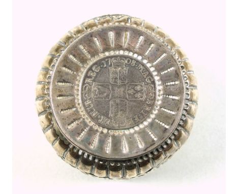 Late Victorian silver bowl, the base set with a Queen Anne Half Crown, 1708, with a band of embossed floral decoration, scrol
