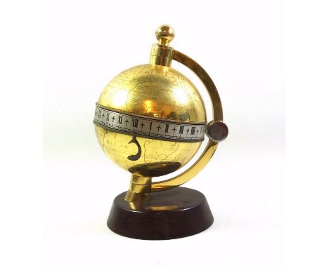 Charles Frodsham, London, brass "Globe Clock", the time being displayed on the rotating silvered chapter ring, with a hinged 