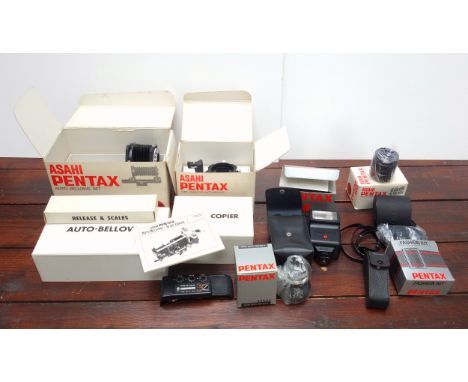 Pentax Auto Bellows Set and Slide Copier, Micro Scope Adapter, Flash gun, and 3 other accessories, mostly boxed. (8)