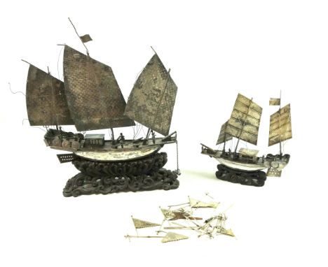 Early 20th Century Chinese Export Silver model of a war junk, with 3 masts, oars, flags, figures and cannons on deck, mounted