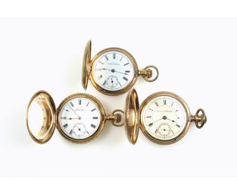 American hunting watch with a circular white enamelled dial inscribed “American Waltham Watch Co.,” black Roman numerals and 